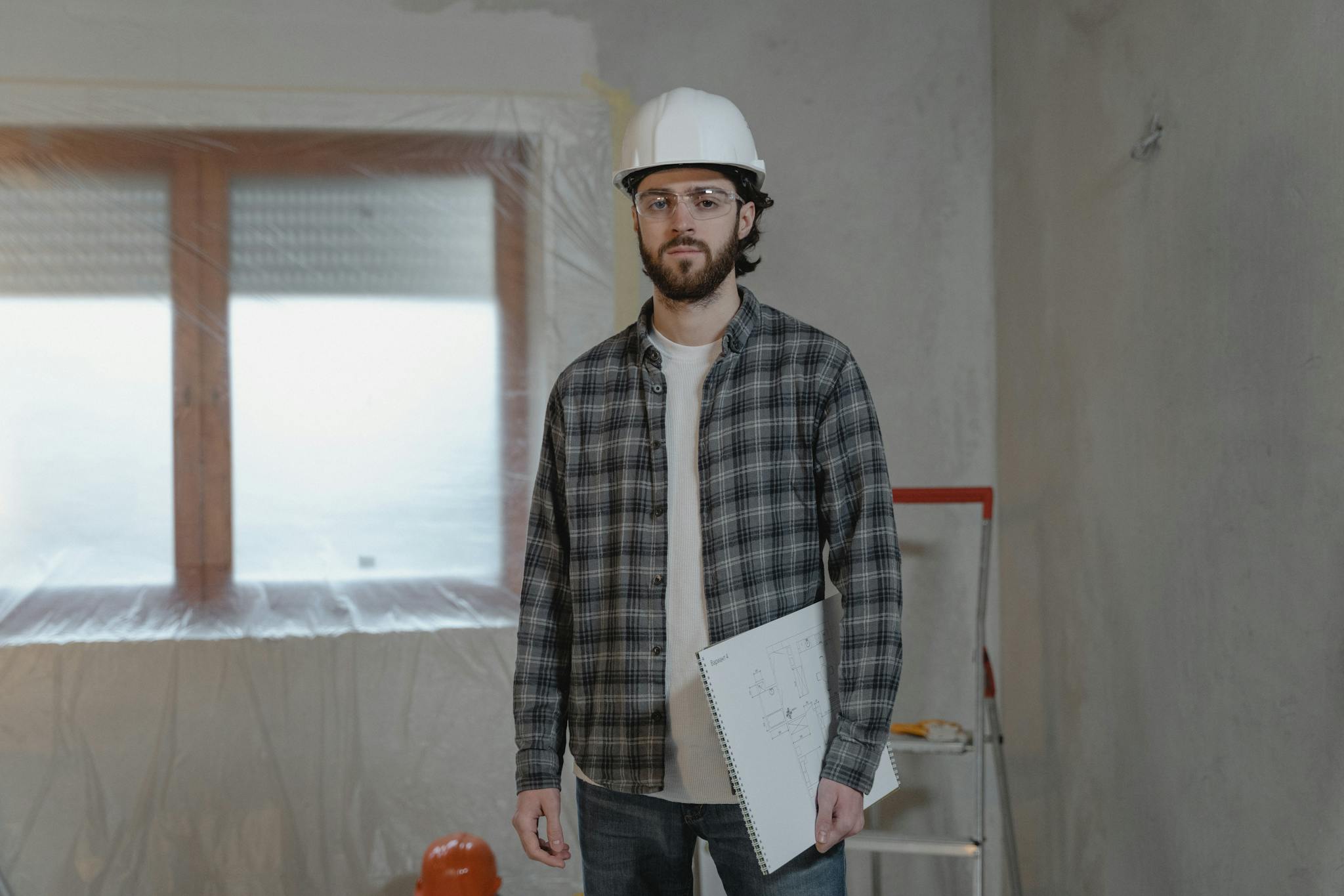man in white and black plaid dress
